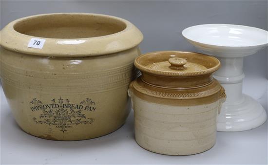 A Victorian white glazed ham stand and two Victorian earthenware jars